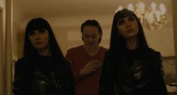 The man in the orange jacket