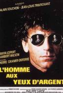 L'Homme Aux Yeux d'Argent